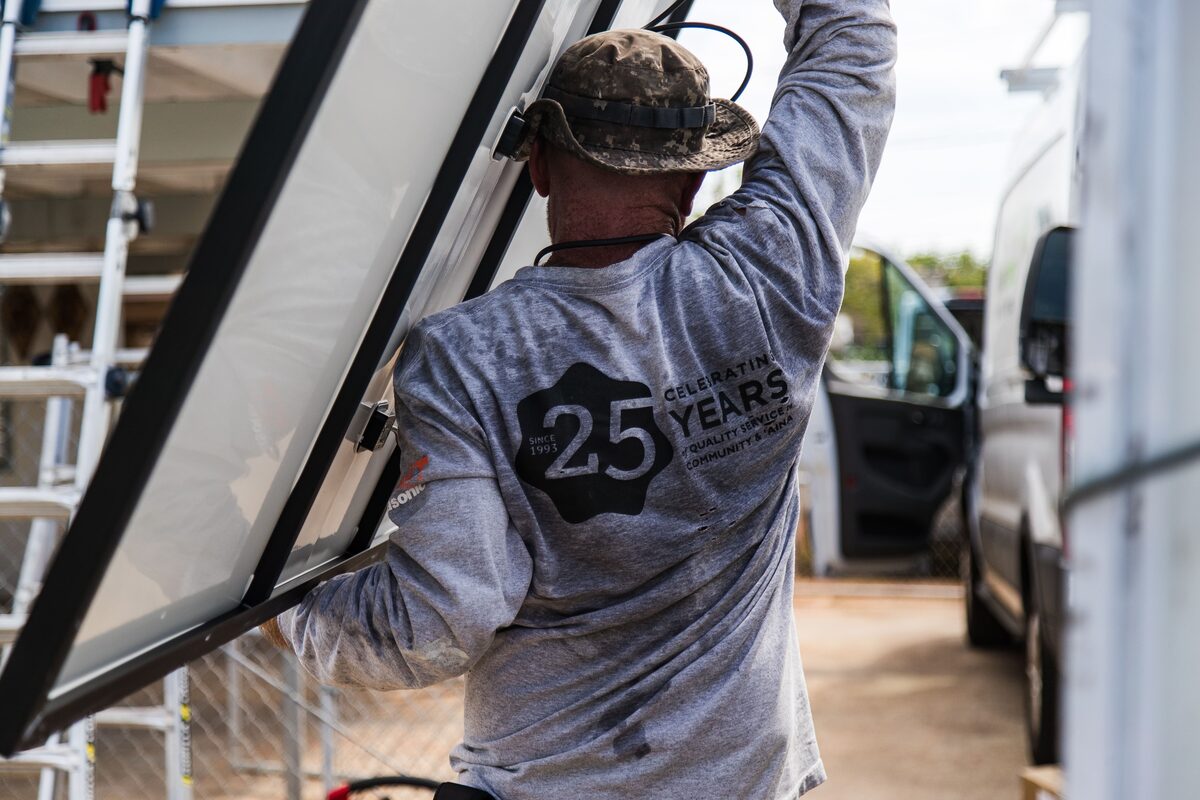 AEI installer with solar panel