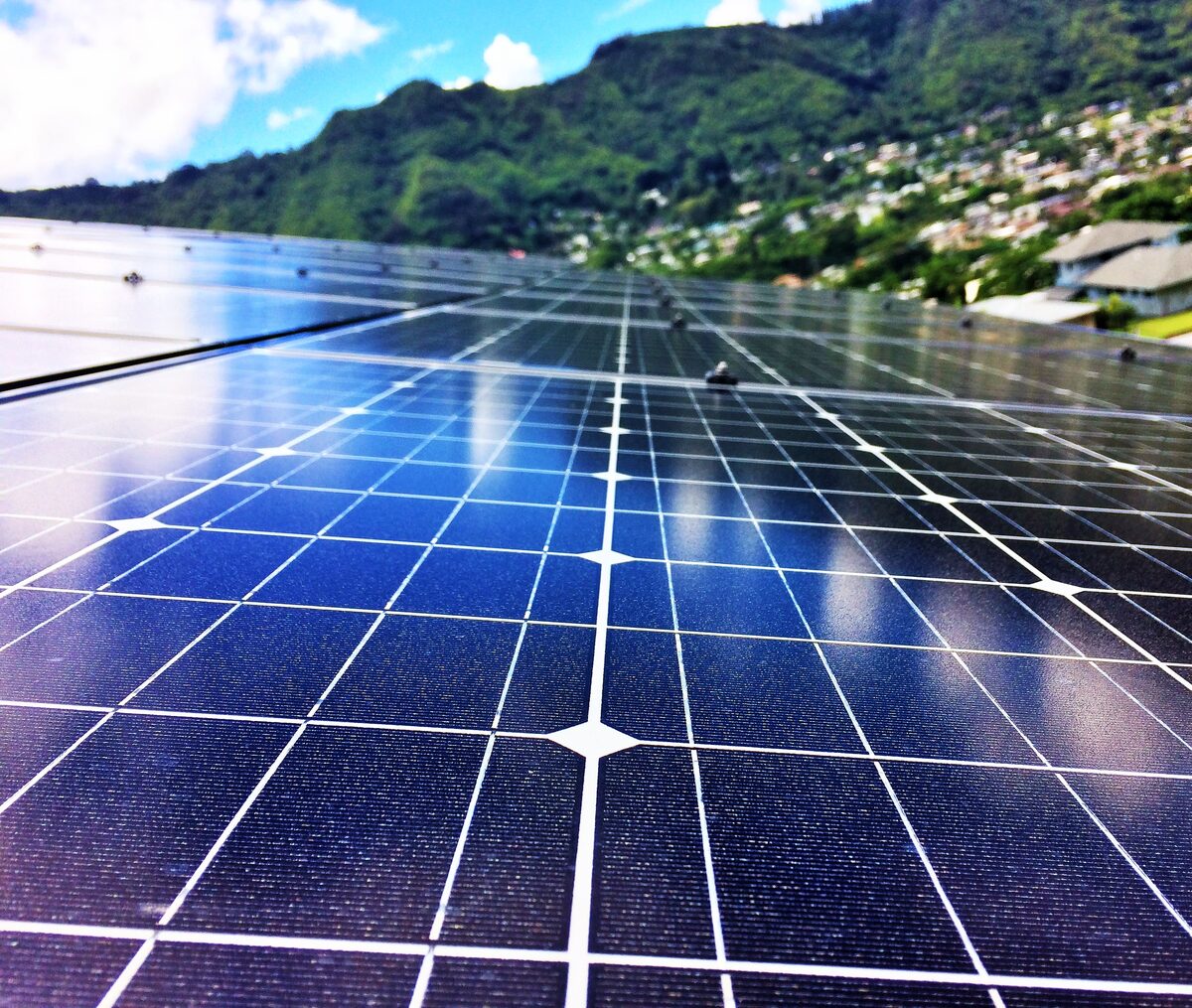 Solar panel array on an Oahu home — inverter architecture determines how the DC power from these panels becomes usable AC electricity